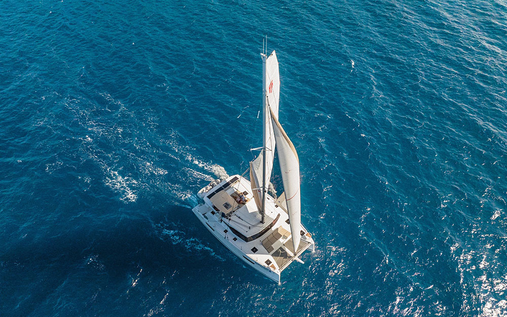 Drone shot of Catamaran sailing